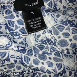 Off the shoulder flowing type of shirt